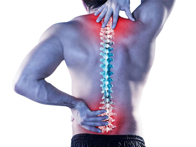 A man showing his backside and he is holding his top back area and lower back area there is a picture of a human spine superimposed on the man's back and highlighting in red areas of concern at the top and lower spine area where the man will need the help and care of a professional chiropractor to provide him with integrated neck and back care in Kuala Lumpur.